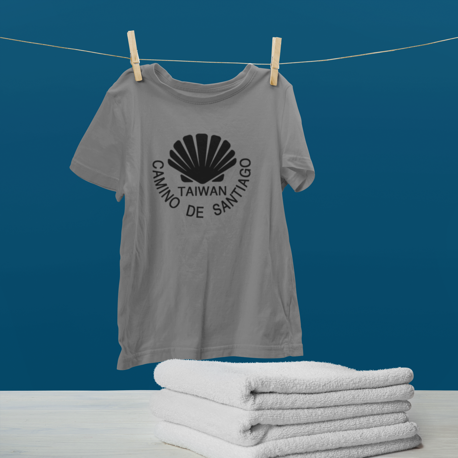 mockup-of-a-hanging-t-shirt-by-some-folded-towels-46150-r-el2 (3)