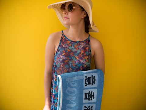 young-girl-holding-a-towel-template-while-against-a-yellow-background-a14894 (1).png