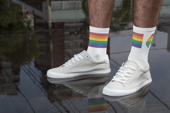 mockup-of-a-man-with-sublimated-socks-standing-on-a-wet-surface-29552 (1).png