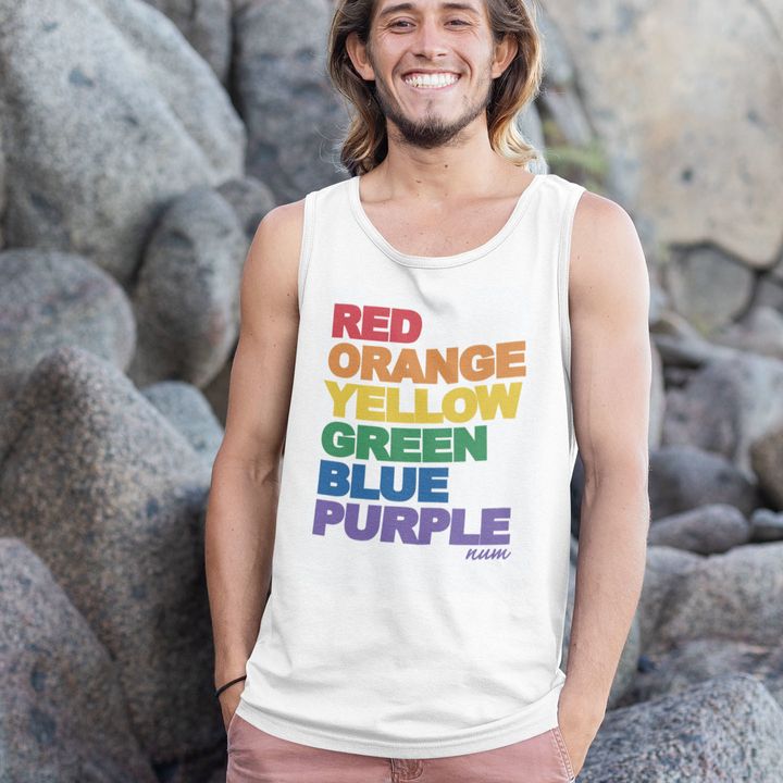 mockup-of-a-cool-man-wearing-a-tank-top-on-the-beach-26746.jpg