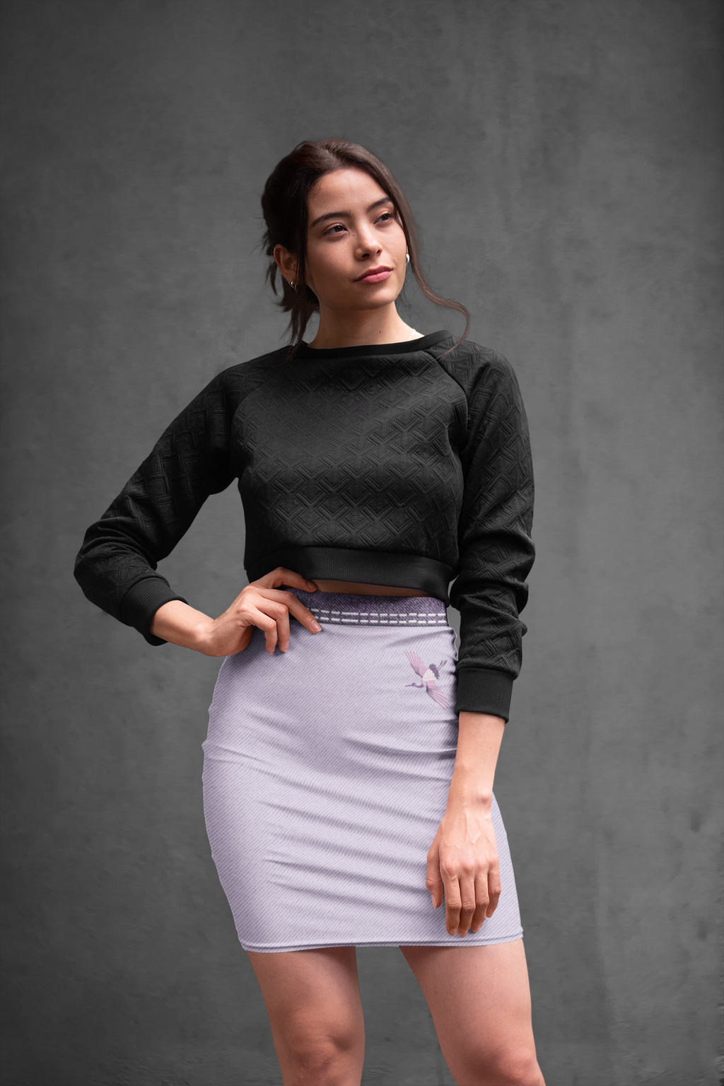 pencil-skirt-mockup-featuring-a-woman-posing-against-a-textured-background-28664.png