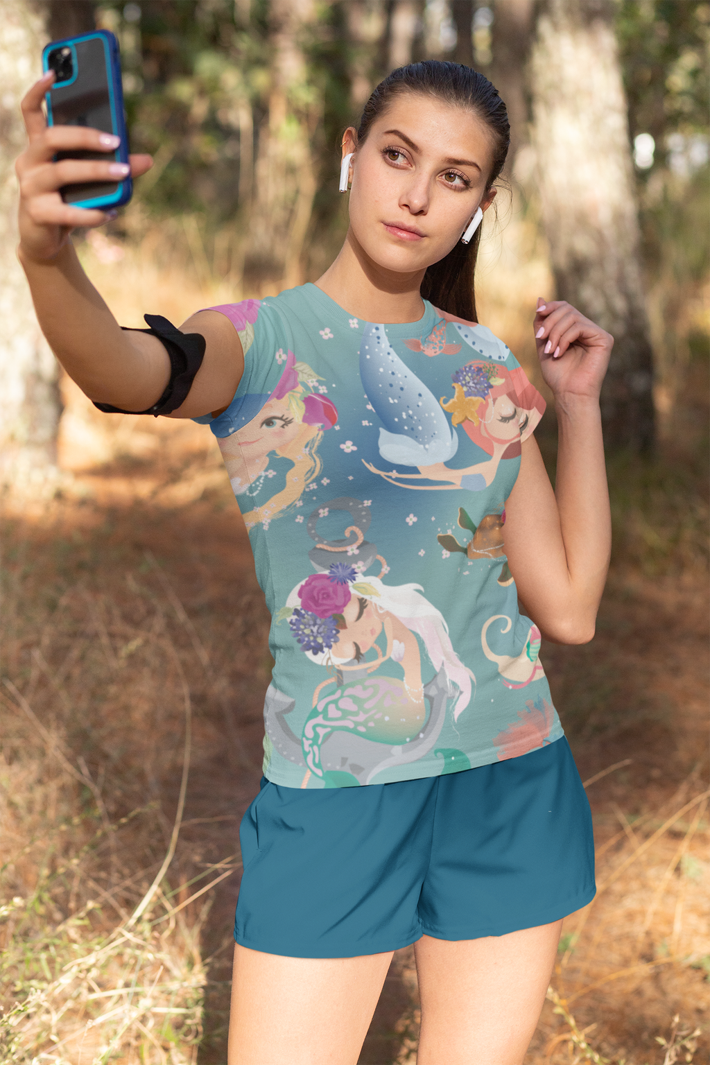 t-shirt-and-shorts-mockup-of-a-woman-taking-a-selfie-33080.png