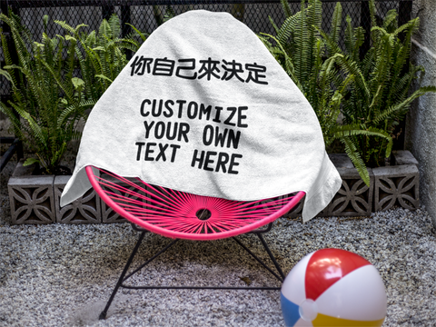 beach-towel-template-on-a-pink-acapulco-chair-near-plants-a14897.png