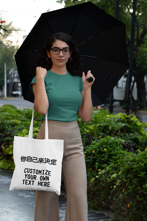 t-shirt-mockup-of-a-woman-with-a-tote-bag-on-a-rainy-day-29414.png