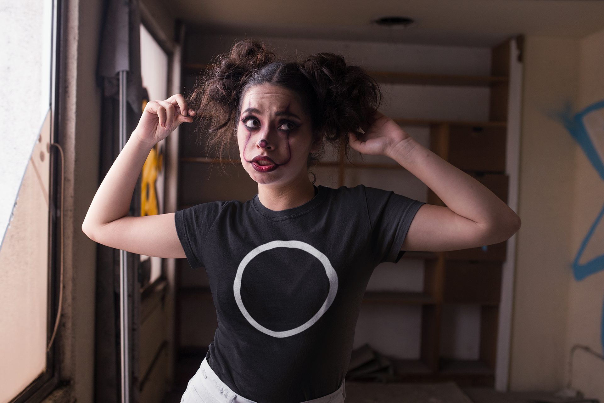 t-shirt-mockup-of-a-woman-with-clown-make-up-for-halloween-22936 (2).png