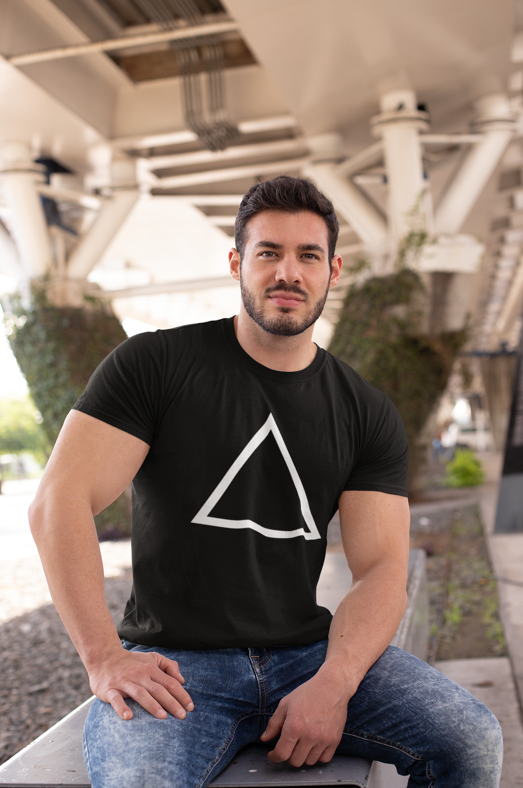 t-shirt-mockup-of-a-muscular-man-sitting-on-a-bench-in-the-city-28516 (1).png