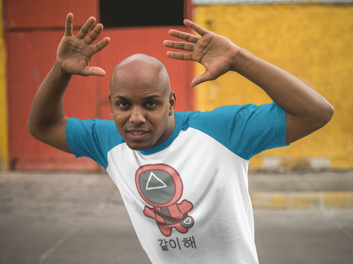 young-man-wearing-a-raglan-tee-and-posing-in-a-parking-lot-mockup-a12474.png