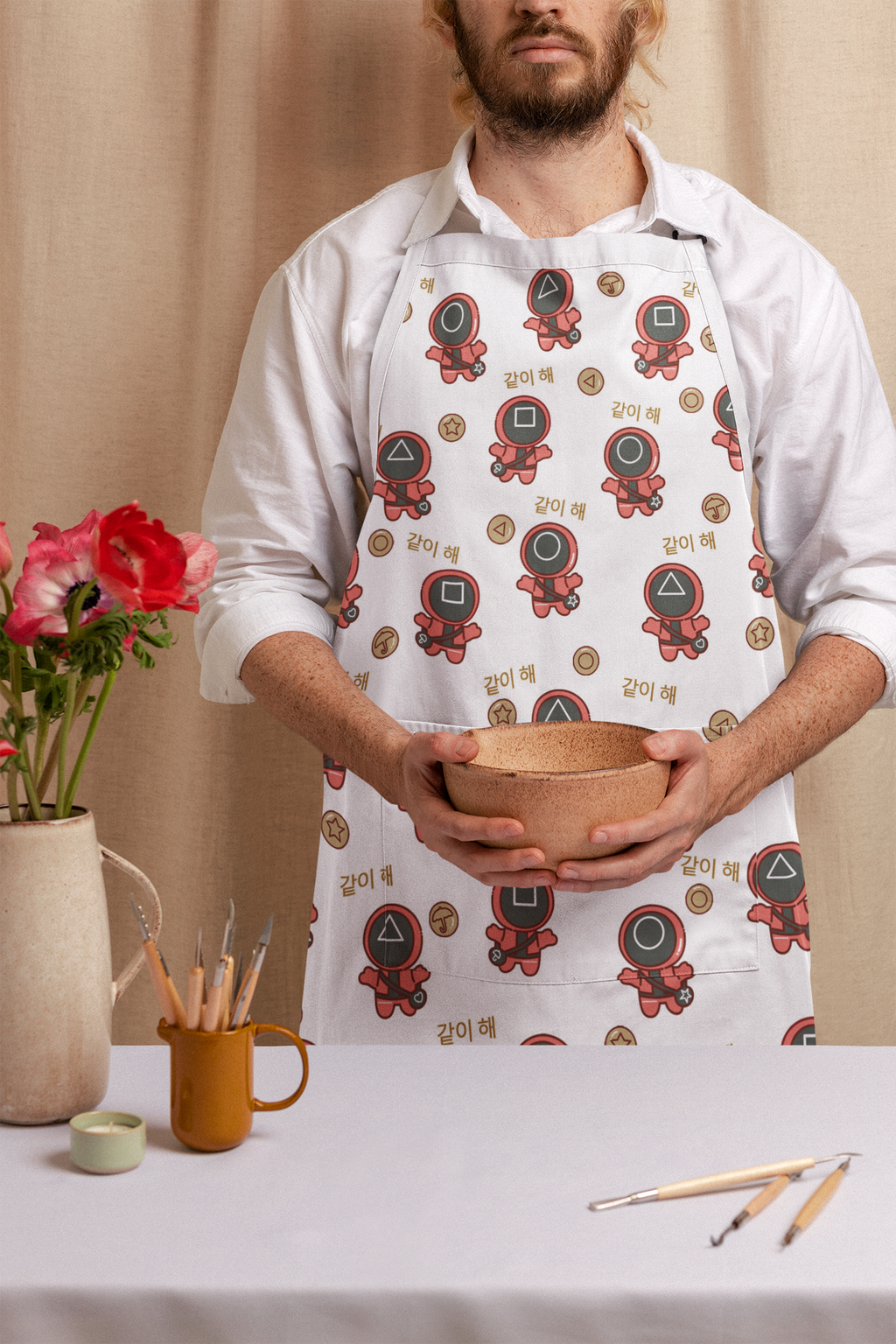 apron-mockup-featuring-a-serious-man-doing-pottery-m23518.png