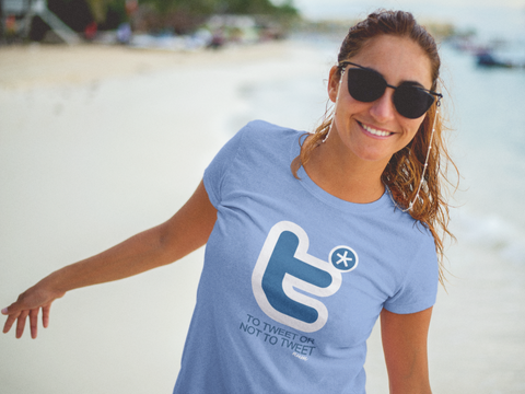 smiling-lovely-woman-wearing-a-t-shirt-mockup-and-sunglasses-at-the-beach-a12725.png