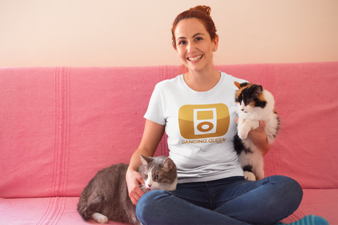 happy-cat-lady-wearing-a-t-shirt-mockup-sitting-on-her-sofa-a18981.png