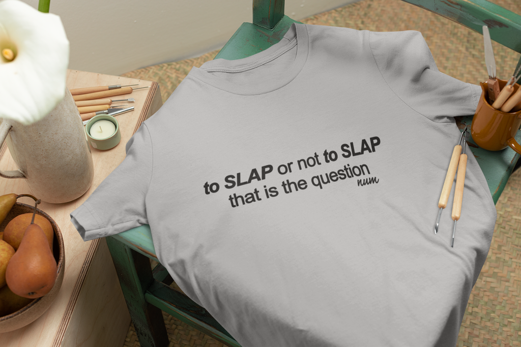 bella-canvas-t-shirt-mockup-lying-on-a-green-wooden-chair-m23496.png