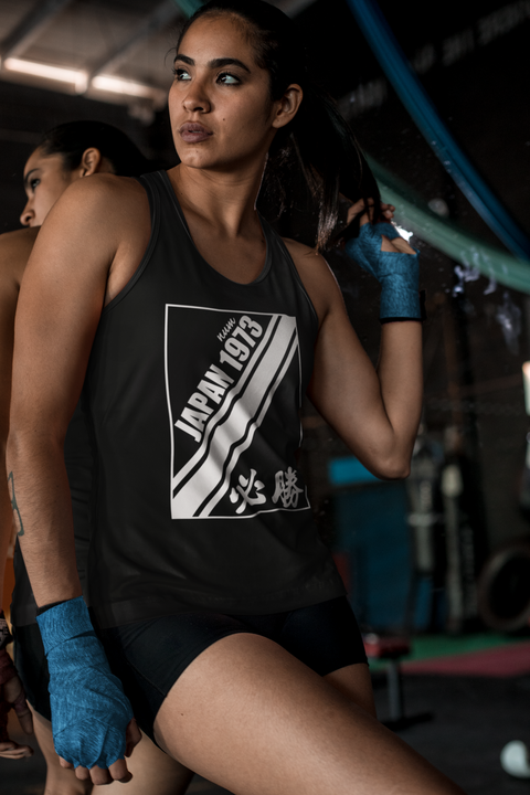 tank-top-mockup-of-a-female-mma-fighter-at-a-gym-26256.png