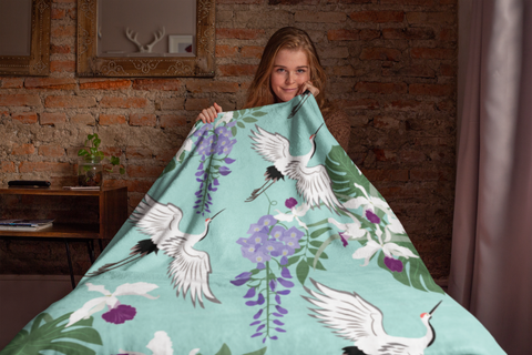 throw-blanket-mockup-featuring-a-girl-sitting-on-a-bed-24677.png