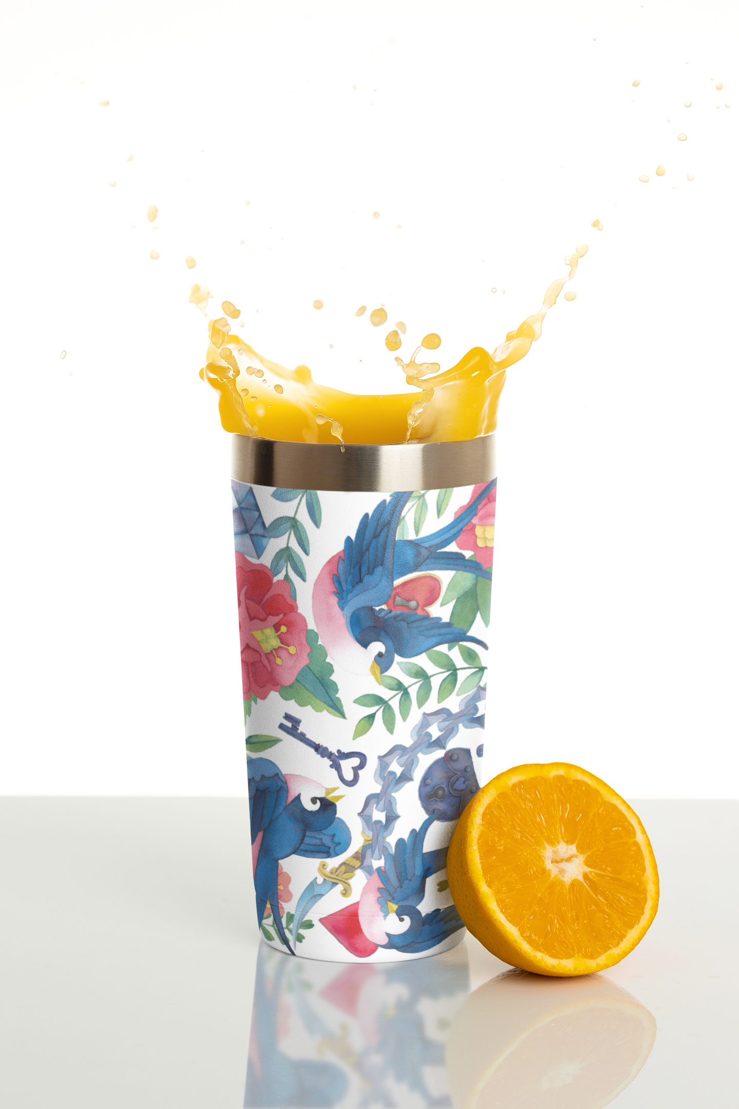 travel-mug-mockup-featuring-an-orange-slice-and-splashing-juice-m24320.png