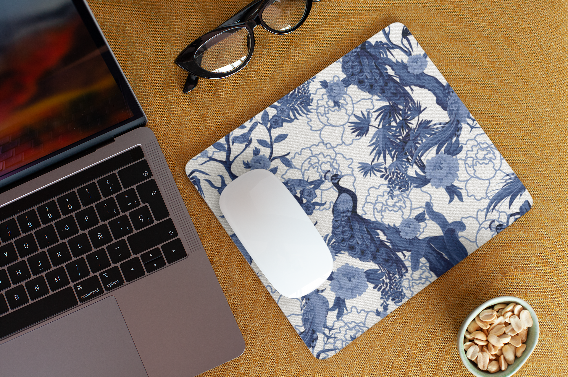 mockup-of-a-mousepad-lying-on-a-work-desk-27566.png