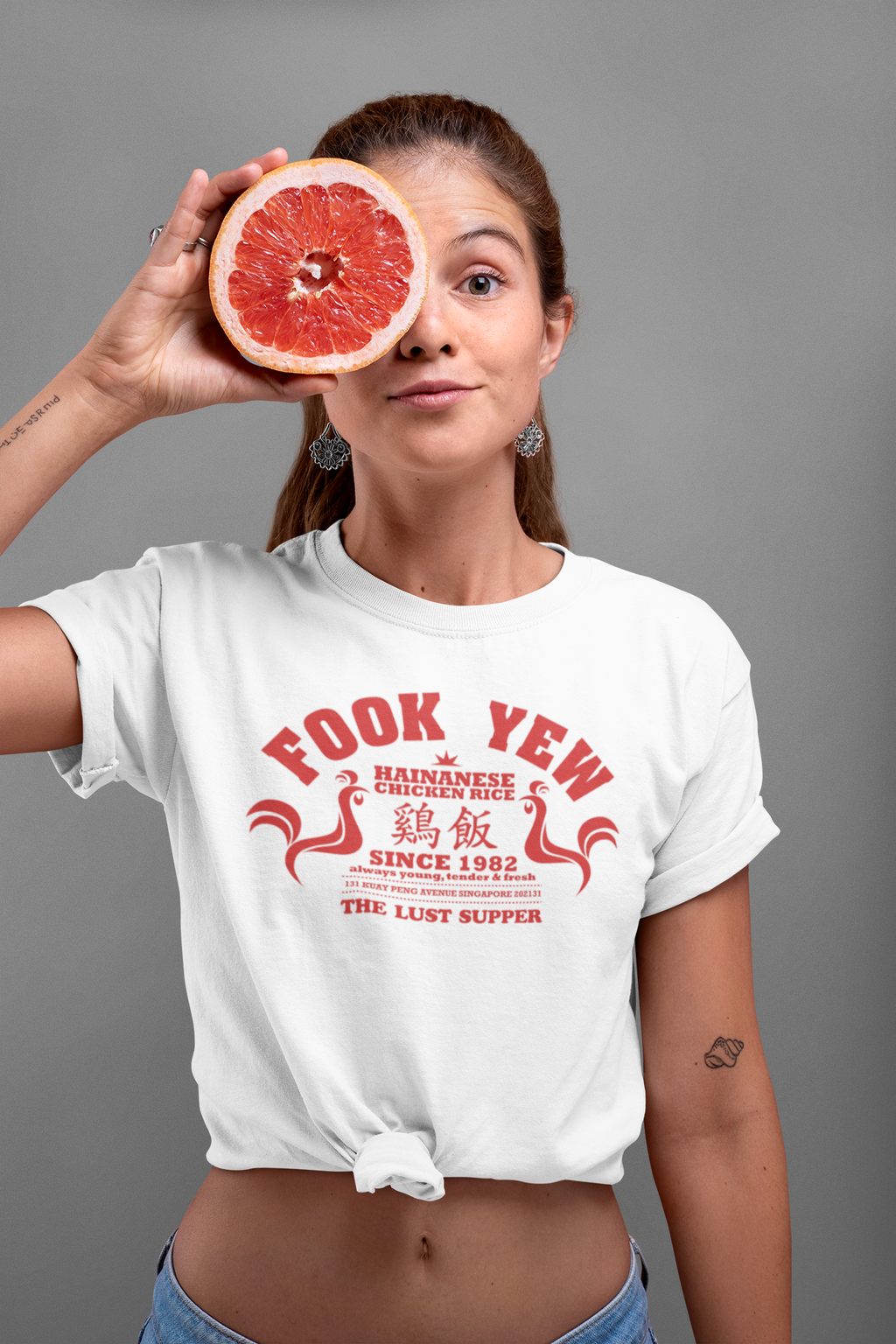 knotted-tee-mockup-of-a-woman-covering-half-of-her-face-with-a-grapefruit-27091.png