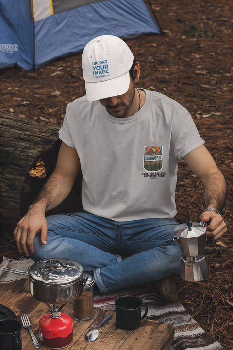 t-shirt-and-dad-hat-mockup-of-a-man-making-coffee-in-a-camping-site-30476 (1).png