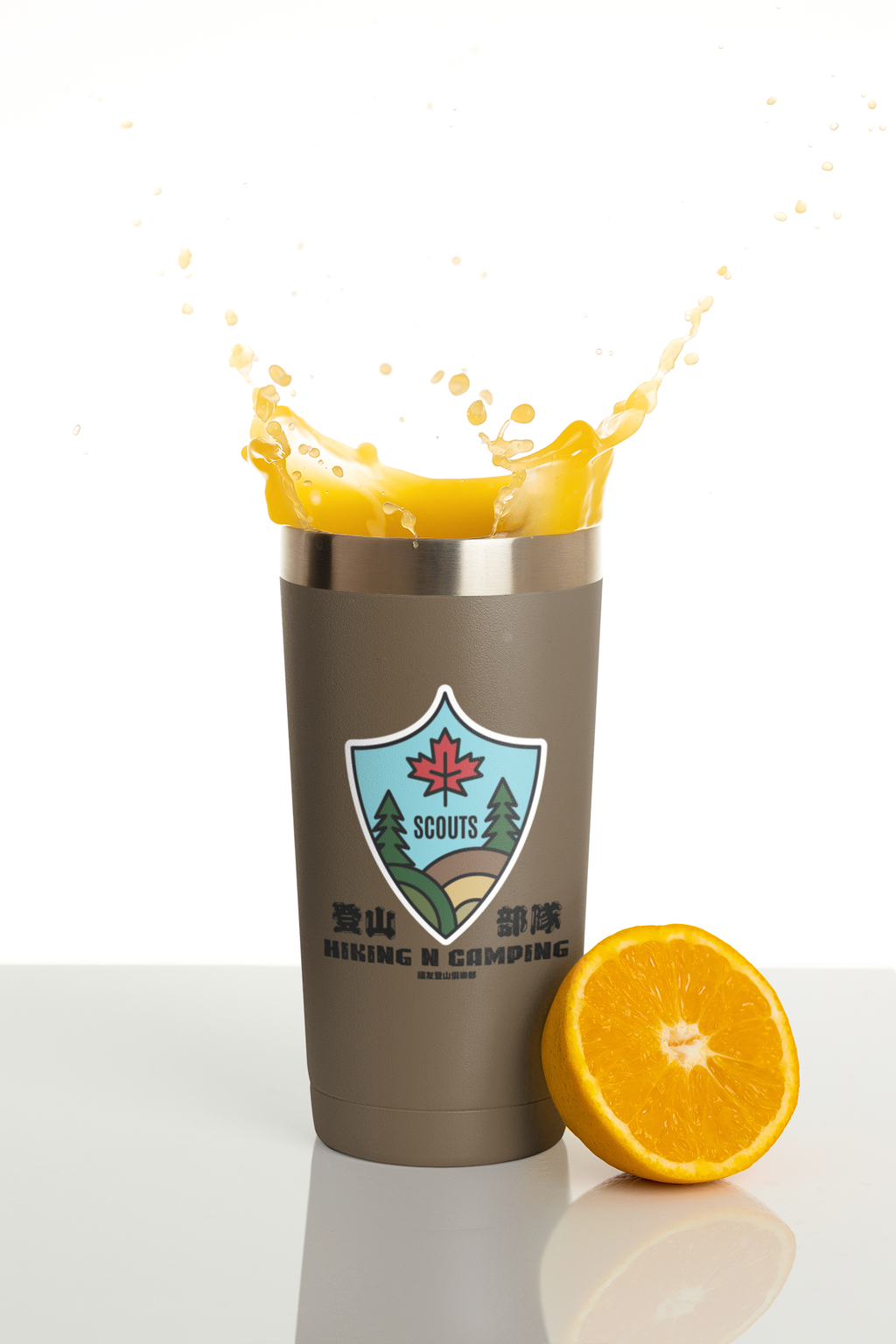 travel-mug-mockup-featuring-an-orange-slice-and-splashing-juice-m24320 (3).png