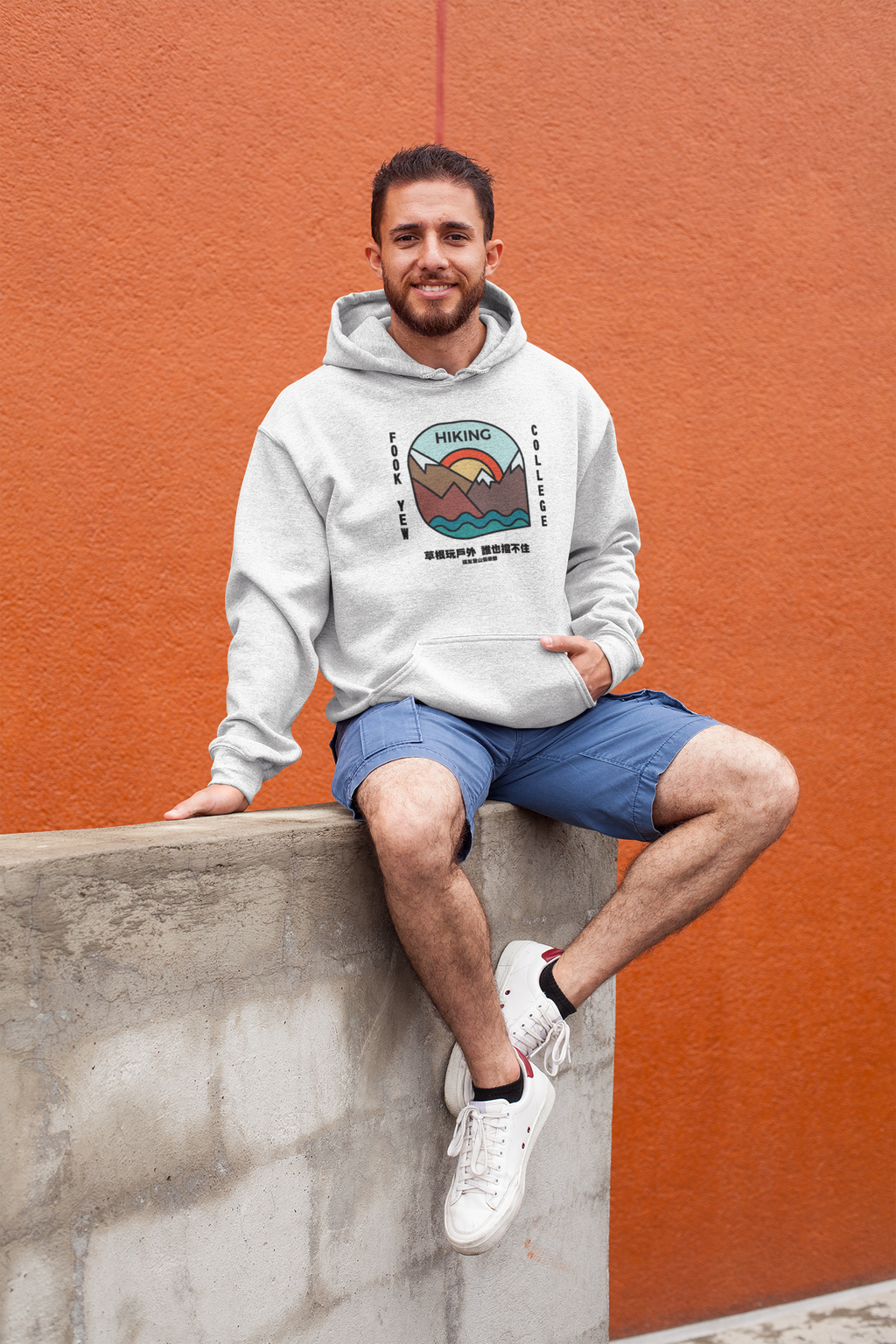 heathered-pullover-hoodie-mockup-featuring-a-smiling-man-sitting-on-a-wall-28626.png