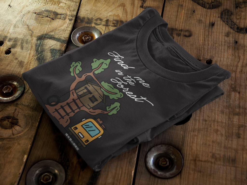 folded-t-shirt-mockup-sitting-on-top-of-a-wooden-table-6486a.png
