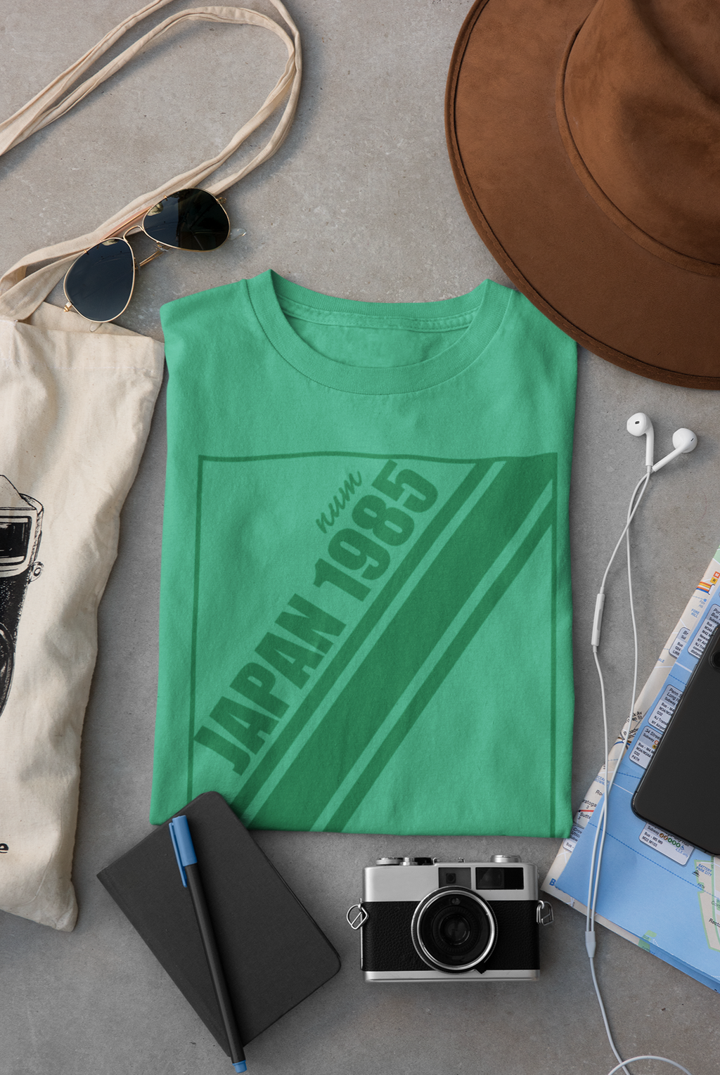 mockup-of-a-folded-t-shirt-placed-between-some-accessories-33794 (3).png