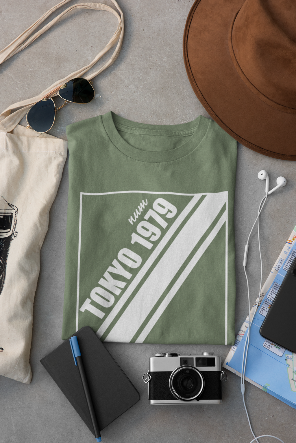 mockup-of-a-folded-t-shirt-placed-between-some-accessories-33794 (5).png