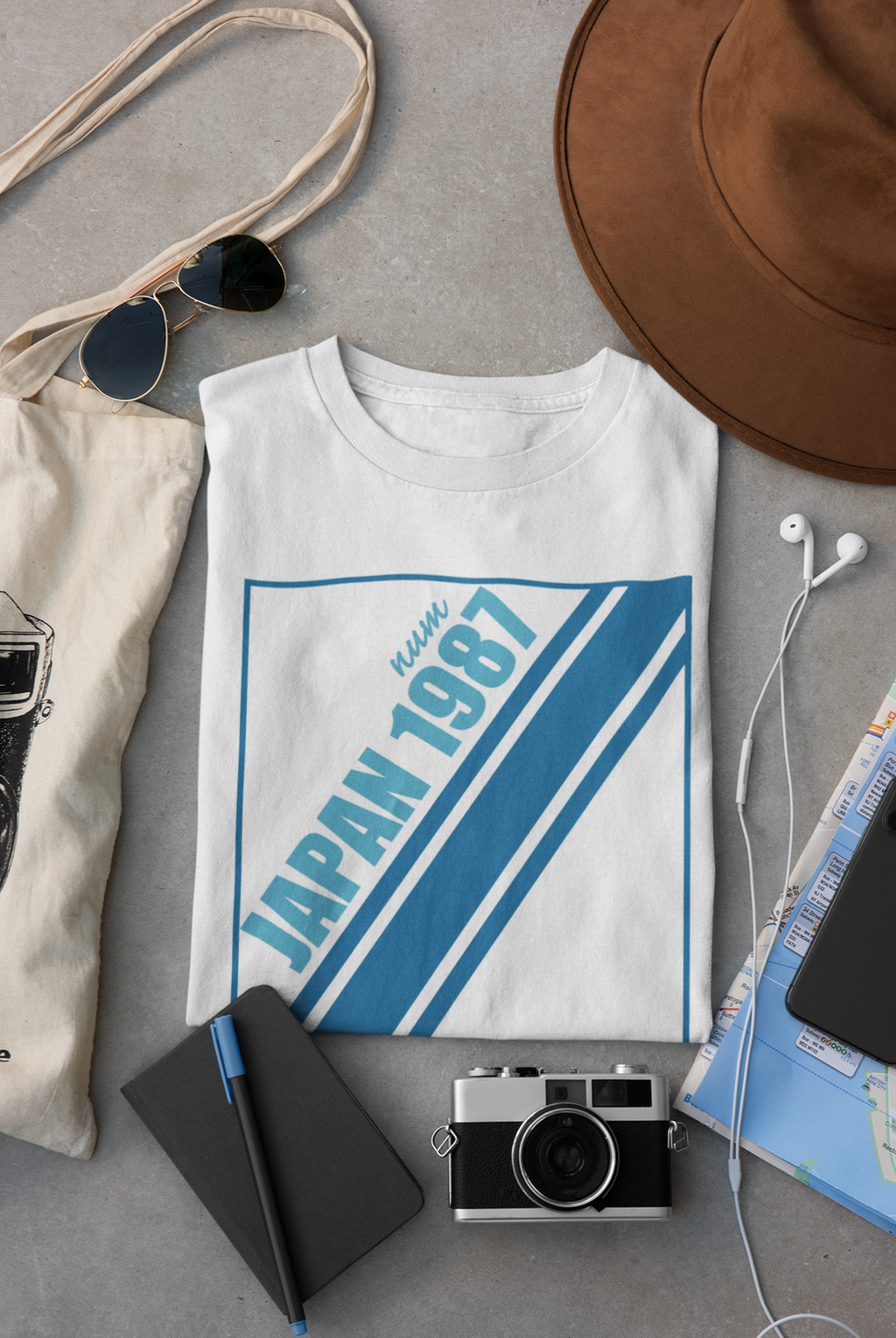 mockup-of-a-folded-t-shirt-placed-between-some-accessories-33794 (6).png