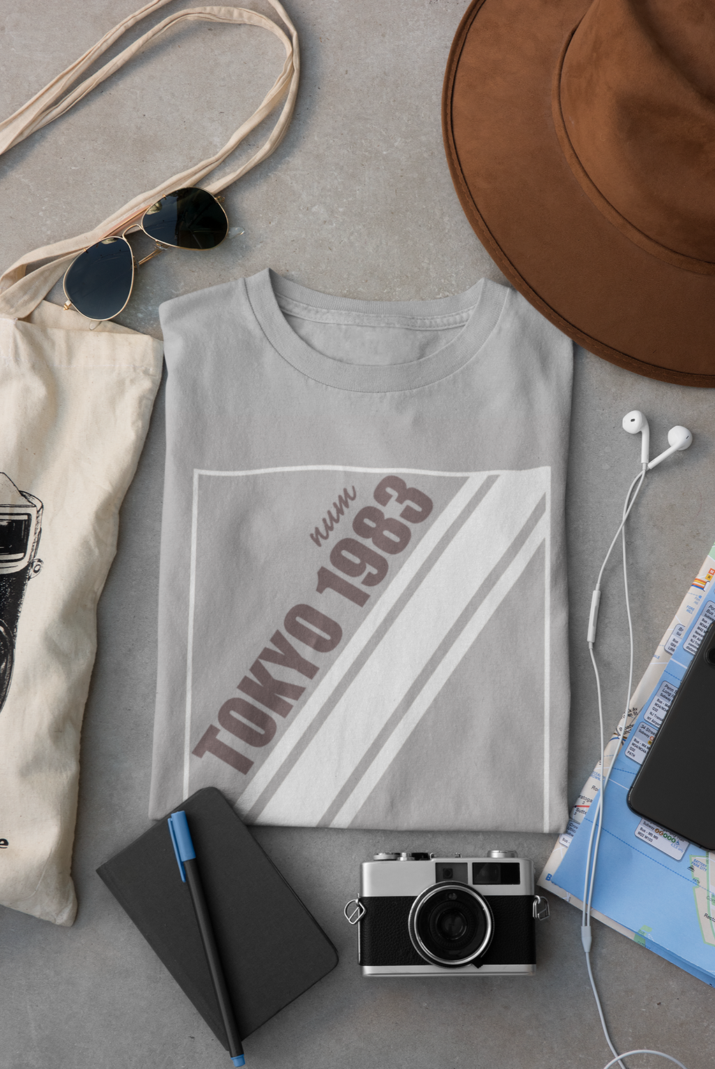 mockup-of-a-folded-t-shirt-placed-between-some-accessories-33794 (10).png