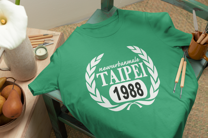 bella-canvas-t-shirt-mockup-lying-on-a-green-wooden-chair-m23496 (1).png