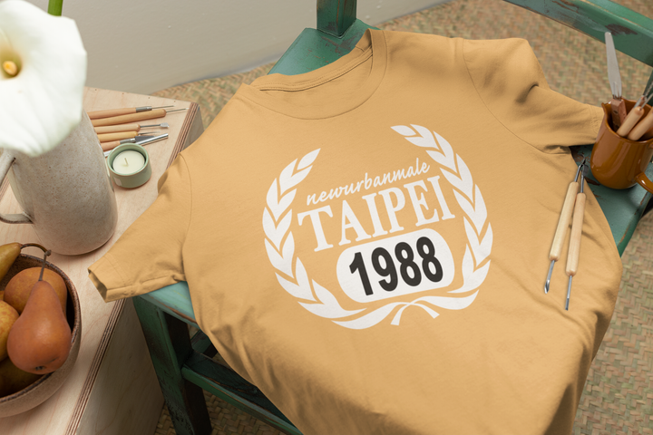 bella-canvas-t-shirt-mockup-lying-on-a-green-wooden-chair-m23496 (2).png