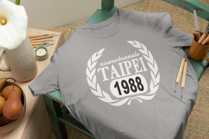 bella-canvas-t-shirt-mockup-lying-on-a-green-wooden-chair-m23496 (6).png