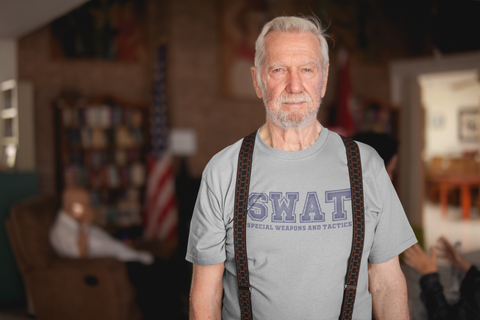 senior-man-wearing-a-tshirt-mockup-and-suspenders-at-the-nursing-home-a20657.png