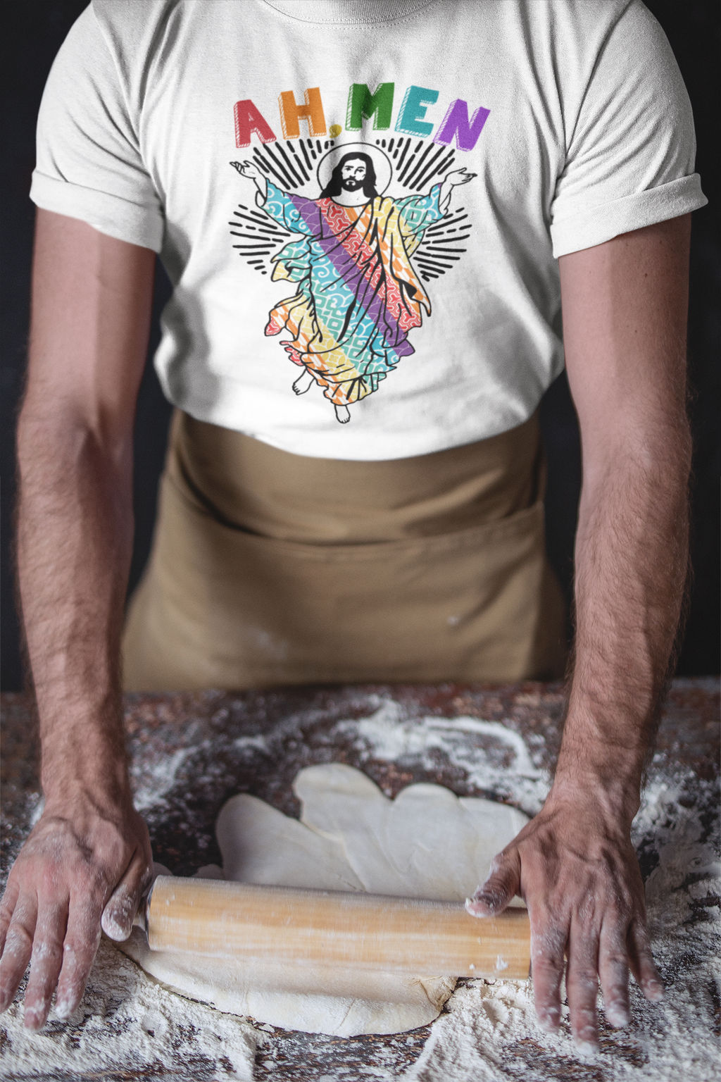 closeup-of-a-baker-wearing-a-t-shirt-mockup-kneading-the-dough-with-a-rolling-pin-a20266.png