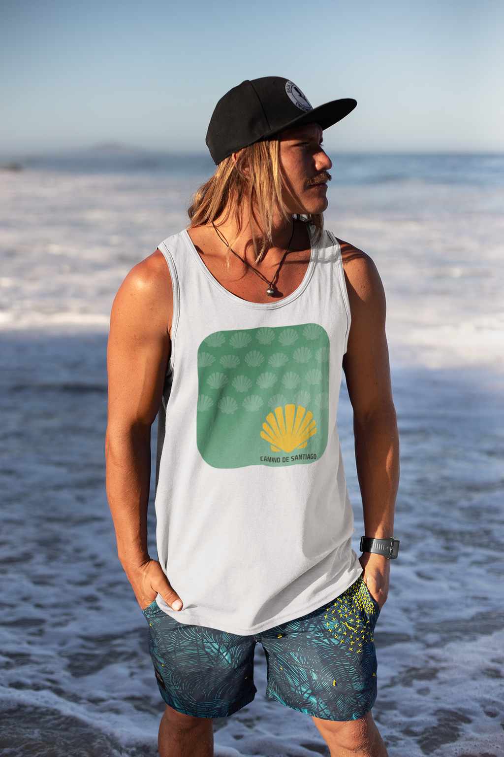 tank-top-mockup-of-a-blonde-man-with-long-hair-and-a-cap-26838