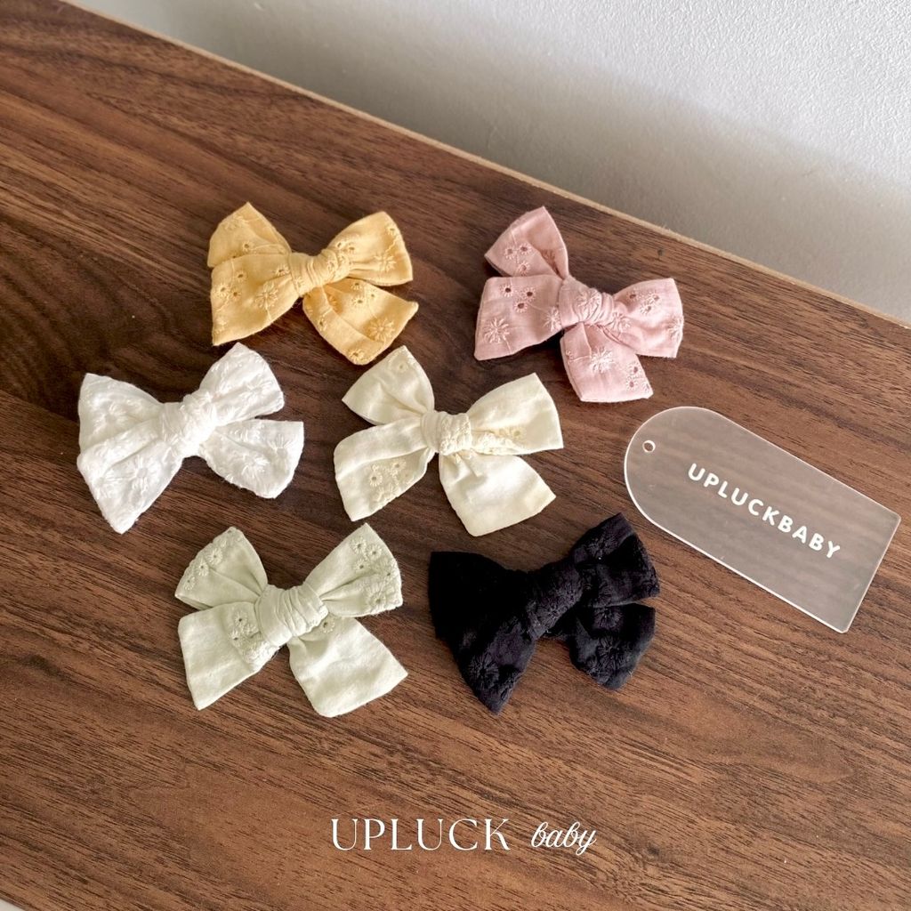 U P L U C K - 7
