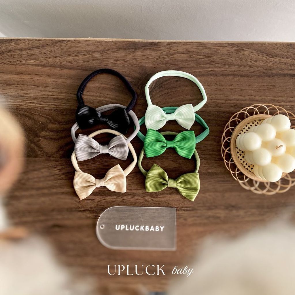 U P L U C K - 6