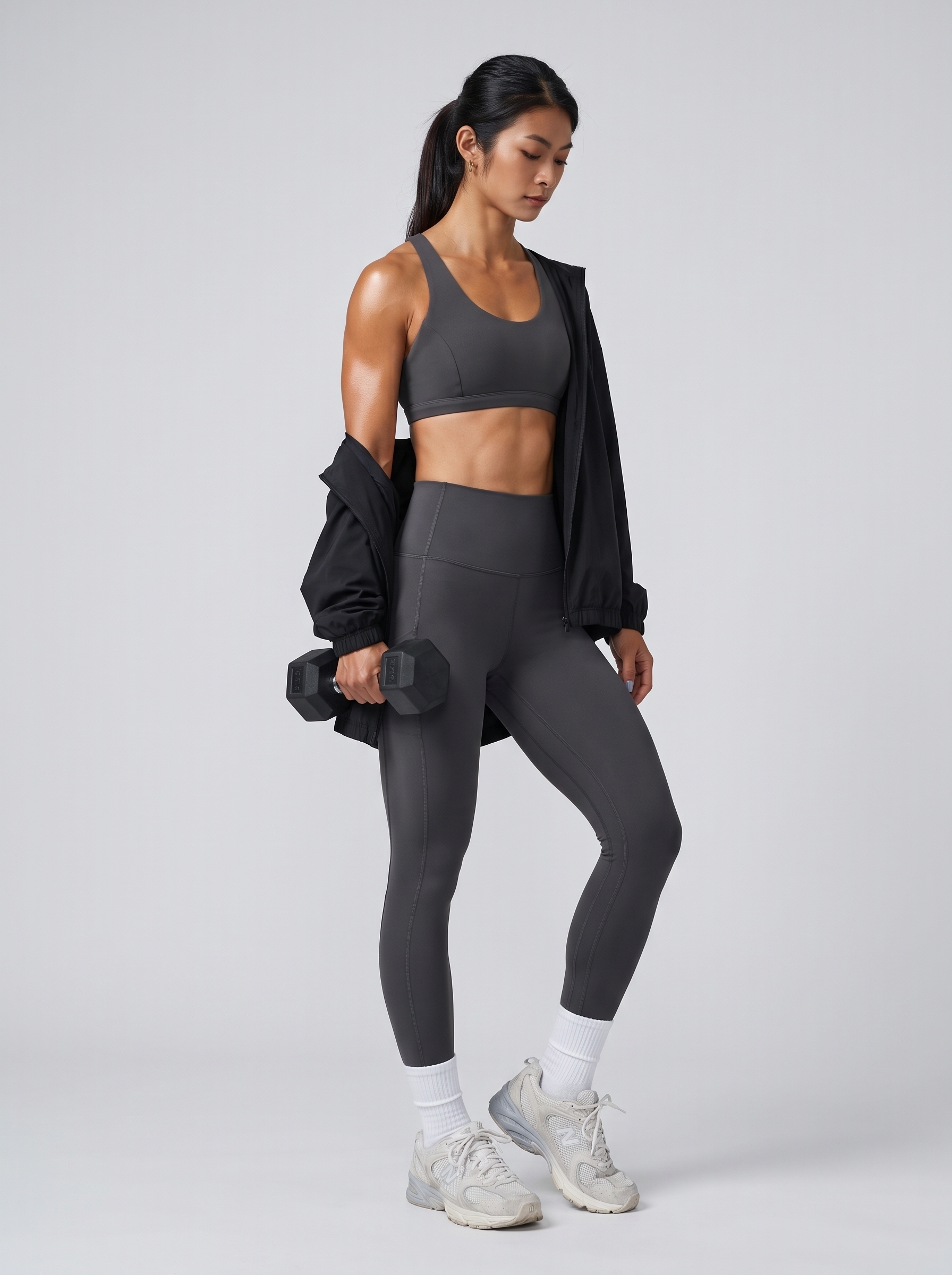 Muscular_woman_holding_dumbbell_2K_20260929203124