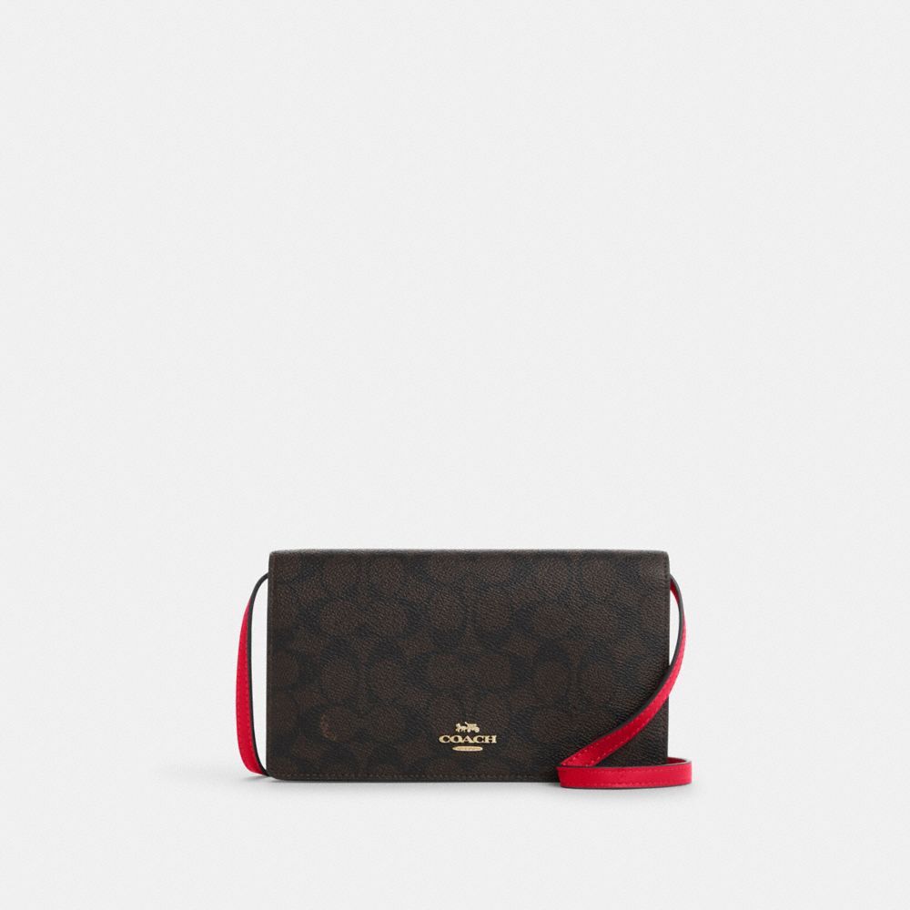 Anna foldover crossbody clutch in signature canvas sale
