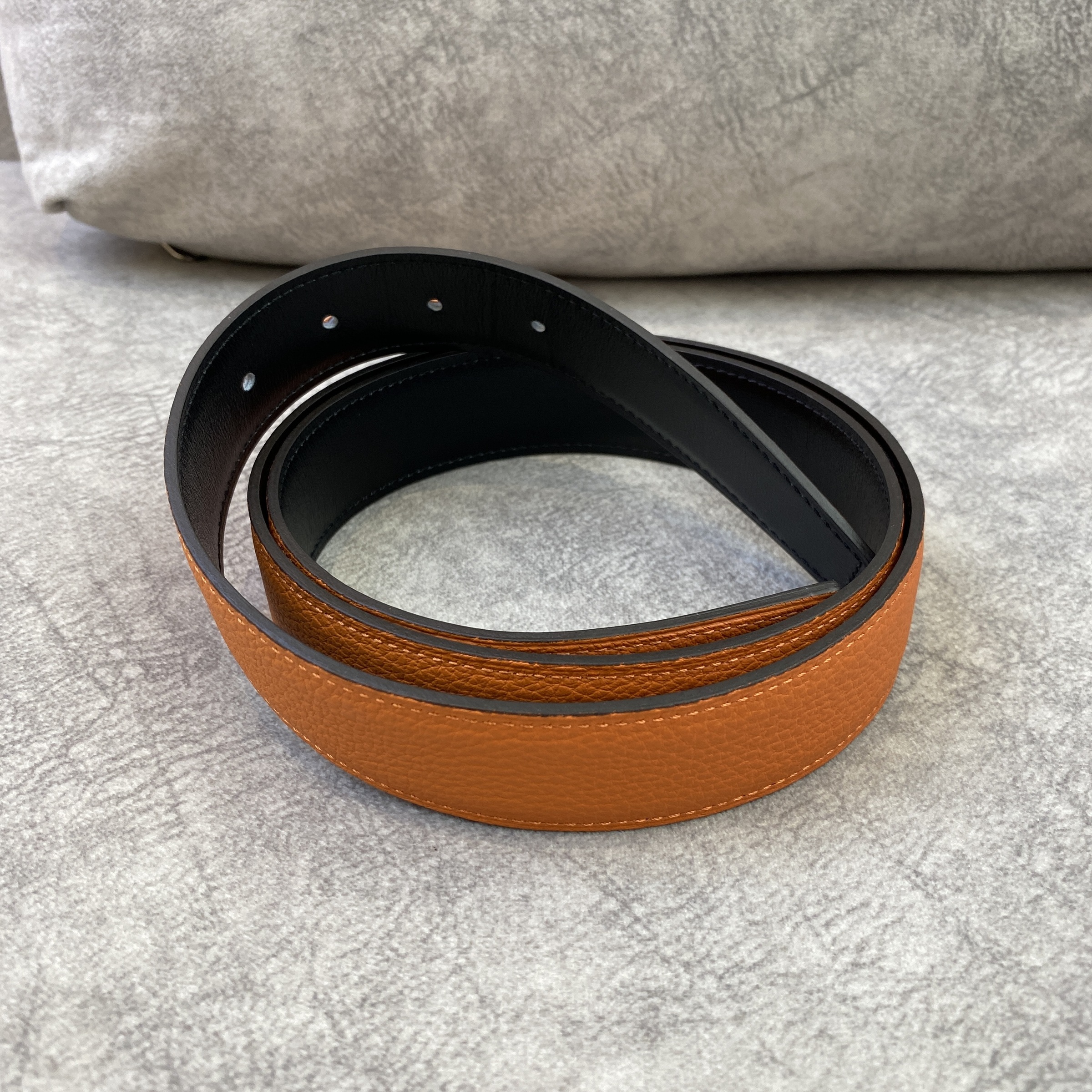 PREOWNED HERMES (ONLY BELT) TEXTURED TANGERINE WITH BLACK CALFSKIN BELT FOR INTERCHANGABLE