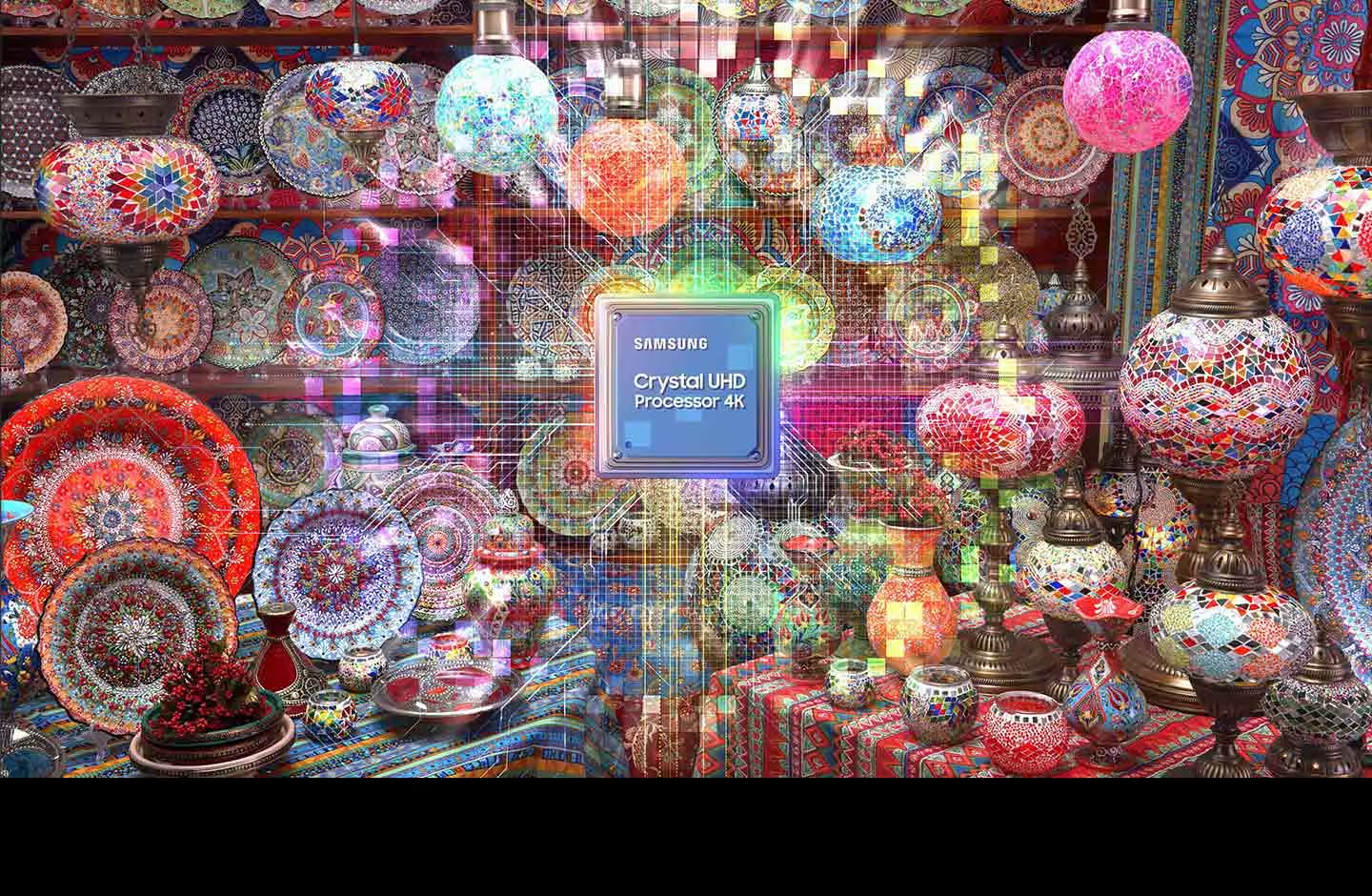Description: The Samsung Crystal UHD Processor 4K chip is on display in the middle amidst many colorful plates and ornaments.