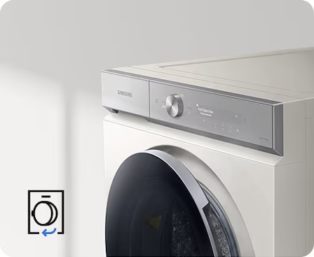 Description: A Bespoke Grande AI washer is placed diagonally, with its door slightly opened. An Auto Open Door icon is in the bottom left corner.