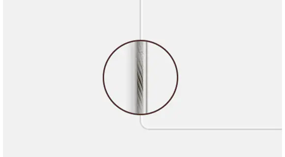 Closeup of One Invisible Connection cable shows its transparent material which greatly reduces its visibility.