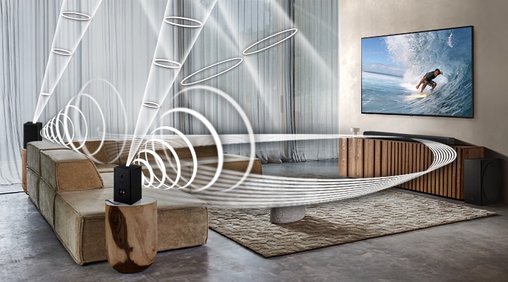 Soundwave graphics are playing from Samsung Wireless Rear Speaker Kit and Soundbar, demonstrating Wireless Surround Sound Compatibile feature of Samsung soundbar.