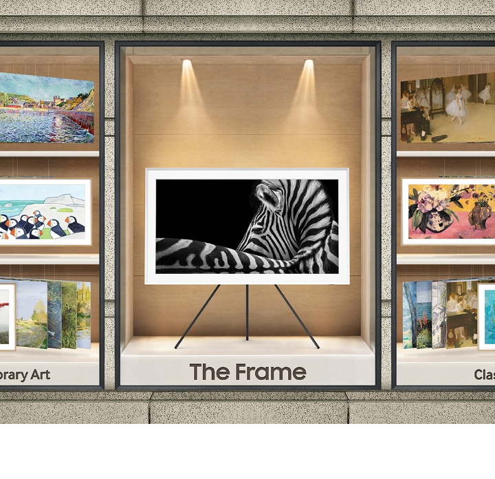 The Frame is being showcased between various artwork pieces.
