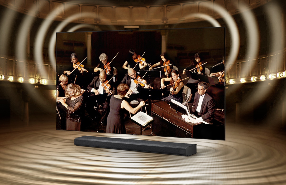 Description: Sound wave graphics from TV speaker and soundbar show that Q Symphony allows sound to be heard simultaneously from TV speaker and soundbar.