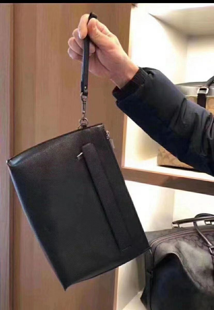 coach carryall pouch