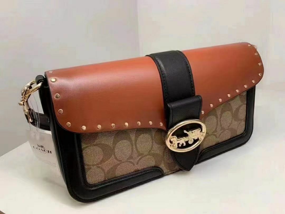 georgie shoulder bolsa in colorblock signature canvas with rivets