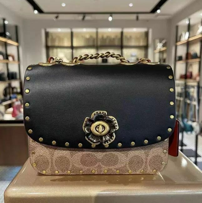 madison shoulder bolsa 16 in signature canvas with rivets