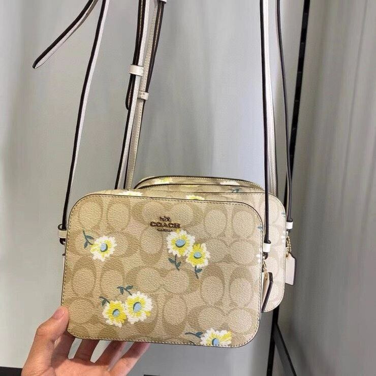 mini camera bag in signature canvas with daisy print