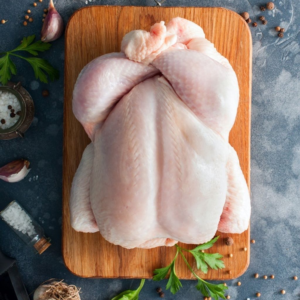 MC-_0044_whole-raw-chicken-on-wooden-board.jpg